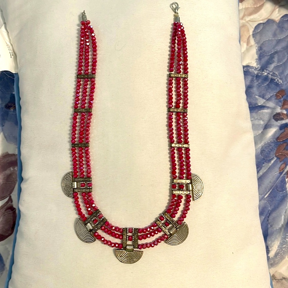 Necklace with red crystal stone